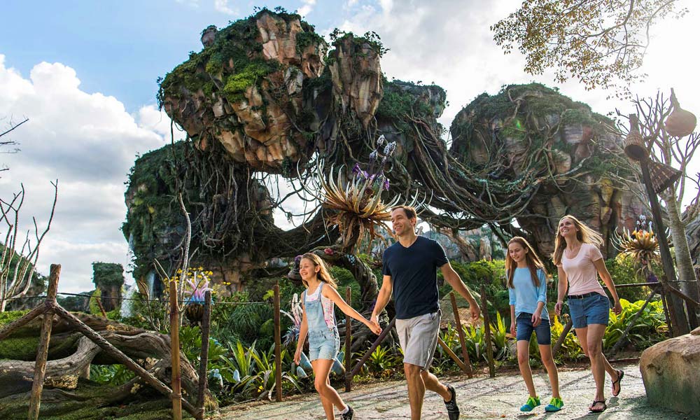 Family Walking Through PANDORA The World Of Avatar At Disney's Animal Kingdom©