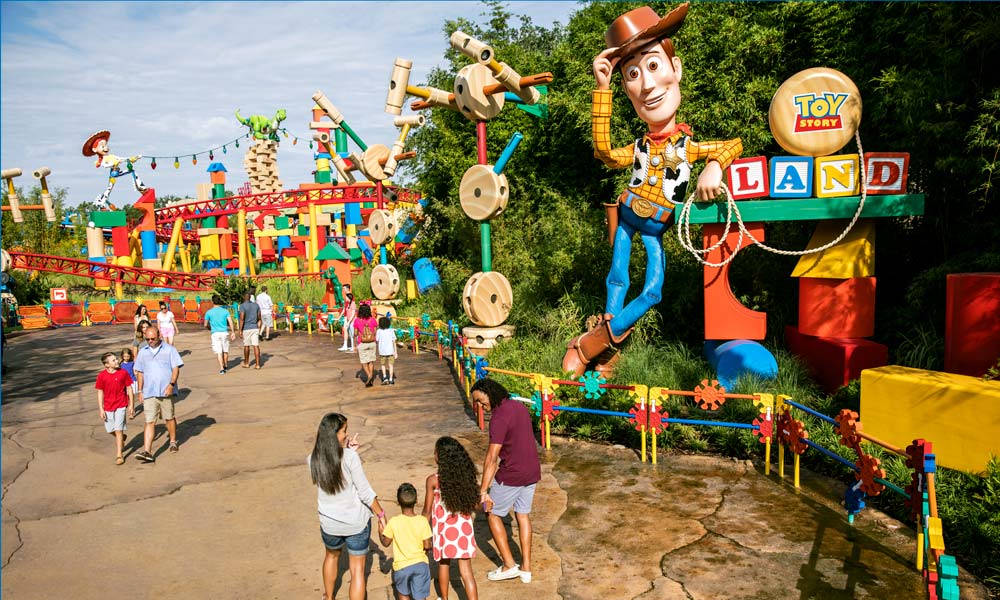 Family Walking Trough Toy Story Land. ©Disney ©Disney/Pixar ©Hasbro, Inc. All Right Reserved. Jenga® Pokonobe Associated.
