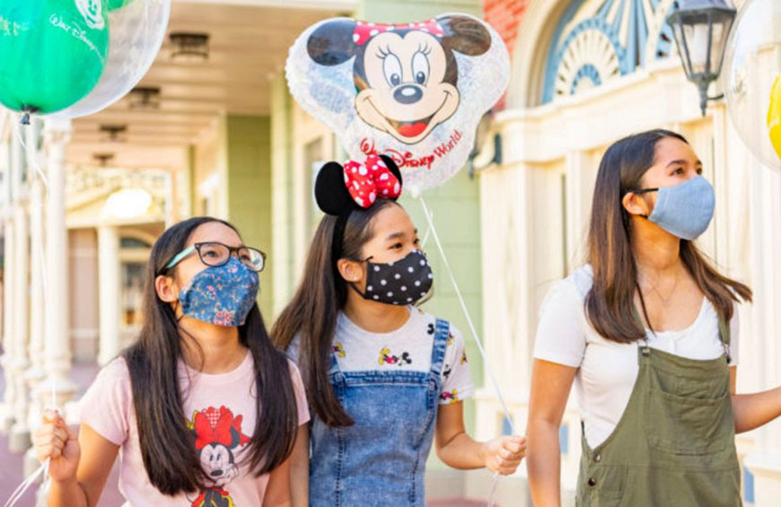 Magic Kingdom Girls Wearing Masks
